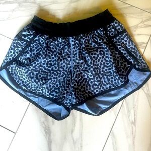 Women’s Lululemon Tracker shorts. Blue and black dots. Size 10